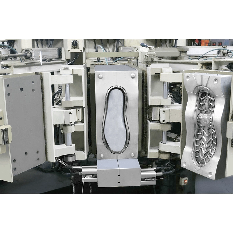Rain-boot mold cavities and tread detail on the supplied PU molding equipment